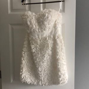 White strapless rosette dress